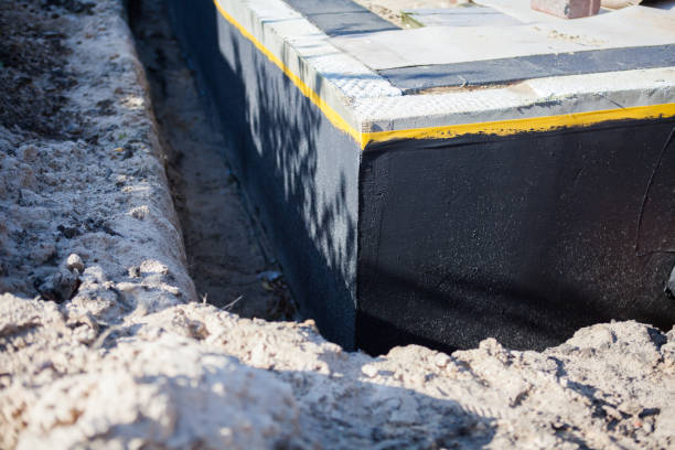 Professional Emergency Waterproofing technician working in Spring Valley, NY